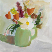 Painterly still life of a floral bouquet in a green pitcher against a pale background