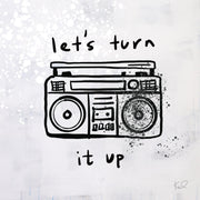 Line drawing of a boombox with handwritten text let's turn it up on grey background