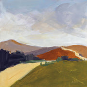 Painted landscape with terracotta hills, purple-grey mountains and green fields