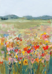 Painterly landscape of a wildflower meadow with mountains in the background