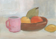 Painting of a pink mug beside a wooden bowl of fruit including a pear, orange and lemon