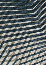 Diagonal navy, tan and white zigzag lines forming a woven geometric pattern