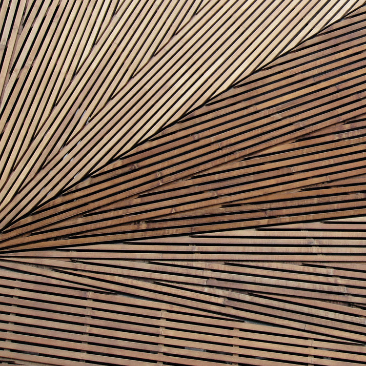 Diagonal wooden slats radiating in a fan pattern with light and dark brown tones