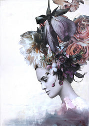 Woman in profile wearing a large floral headdress of roses and peonies in muted tones