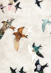Flock of patterned bird silhouettes in bronze, teal and pink on a textured cream background