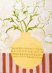Painting of white flowers in a yellow patterned vase on a striped tablecloth
