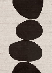 Four stacked dark rounded stone shapes on a textured cream linen background