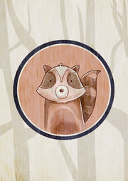 Illustrated raccoon in a circular navy frame on a wood grain background with tree silhouettes