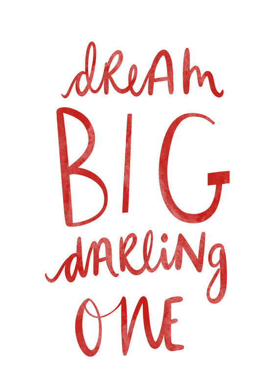 Red hand-lettered typography reading Dream Big Darling One on a white background