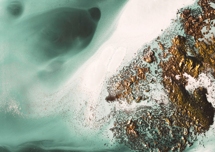 Teal and white marbled fluid art with metallic gold and bronze textured clusters and a dark silhouette shape.