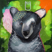 Close-up painting of a bear with gold dot detailing, floral linework, and colourful background.